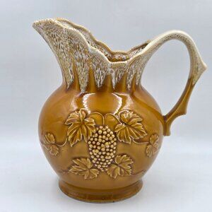 Amber Yellow Glaze with White Drip Glaze Embossed Grape Cluster Pitcher